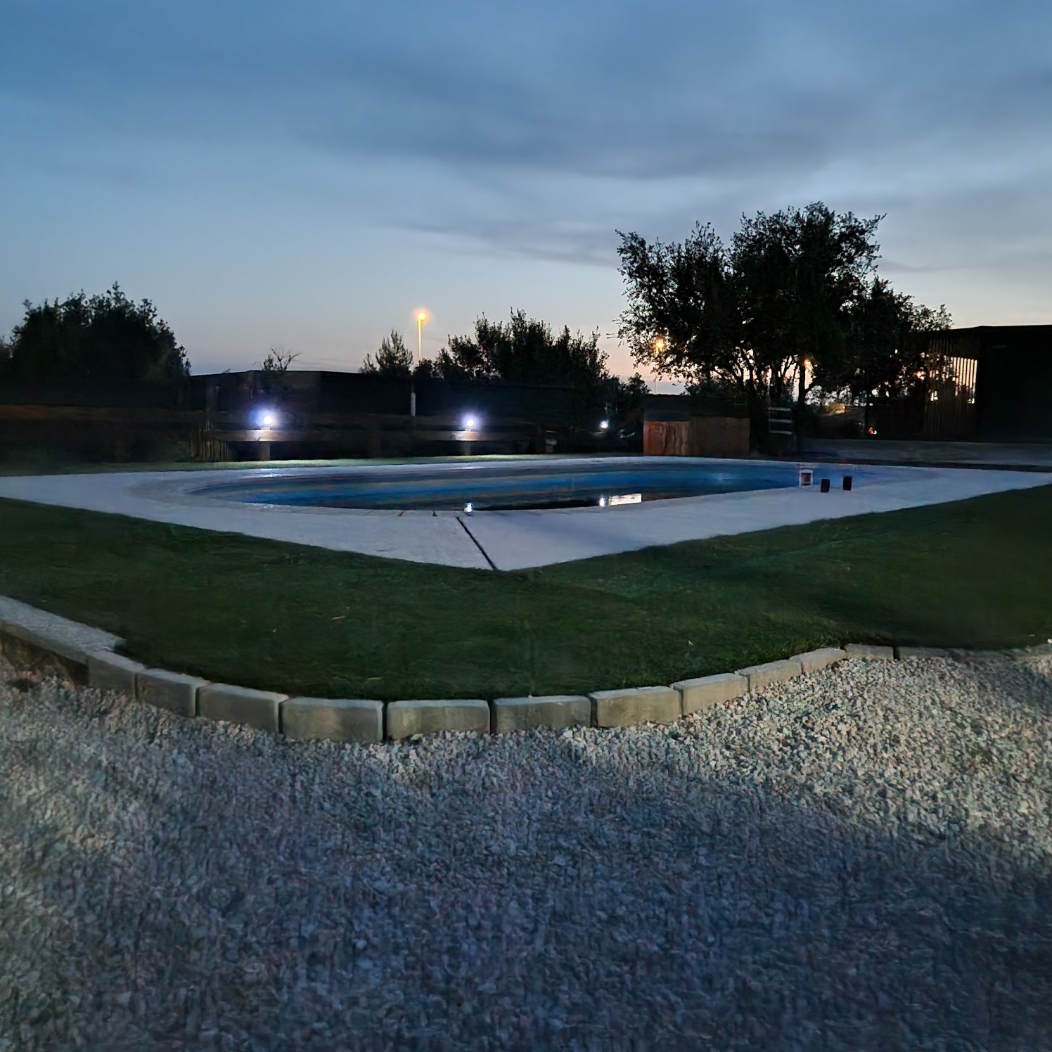 Albatross I - swimming pool with illuminated yard in the evening