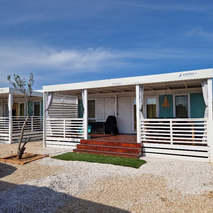Albatross II - exterior view of the mobile home with covered terrace