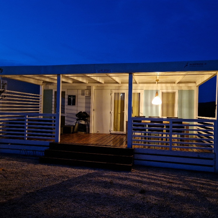 Albatross II - illuminated mobile home in the evening atmosphere