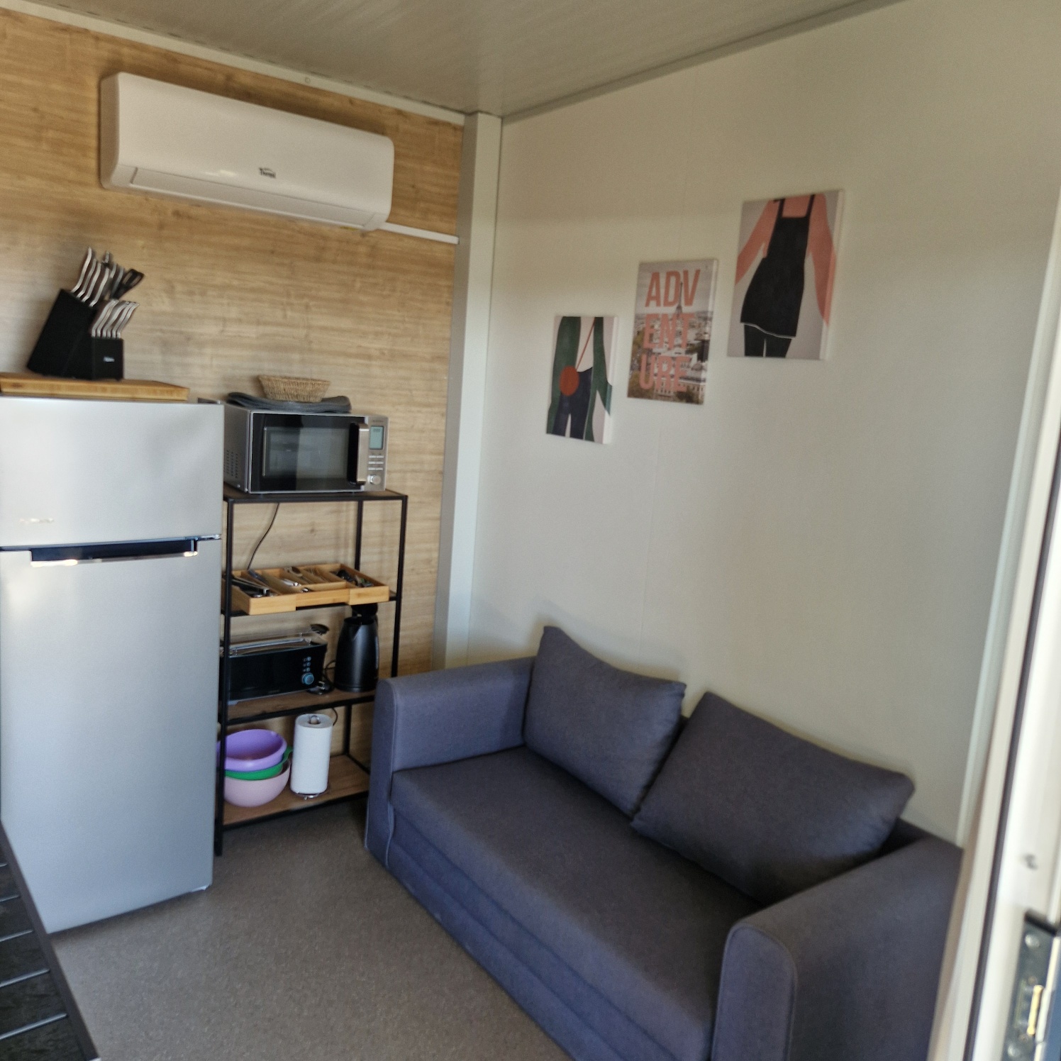 Albatross III - living area with sofa and kitchen space