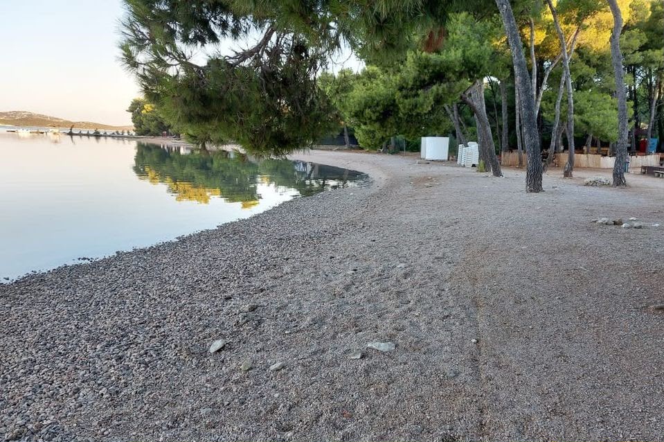 Pebble shoreline at Miran Beach in Pirovac